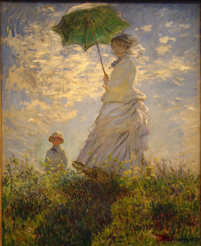 Femme avec un parasol